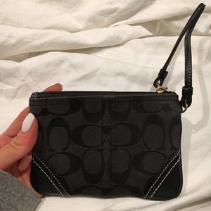 Black small original Coach wristlet